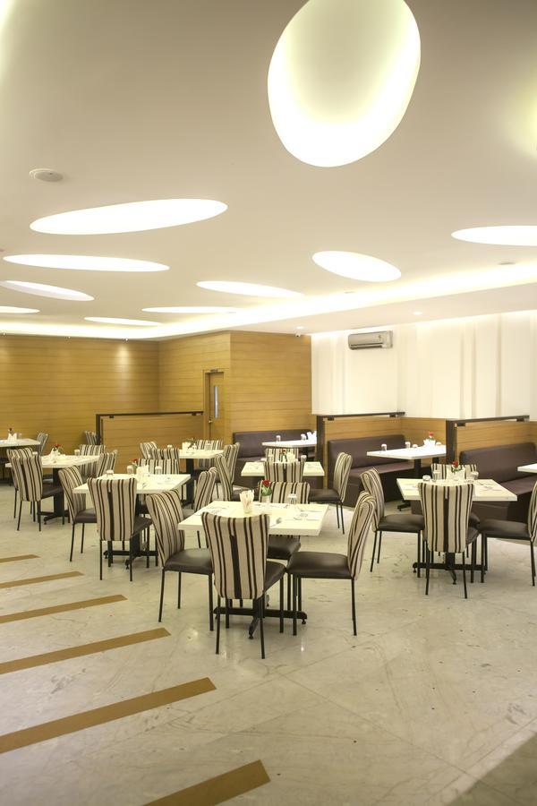 Comfy Luxury Hotel Bangalore Bagian luar foto