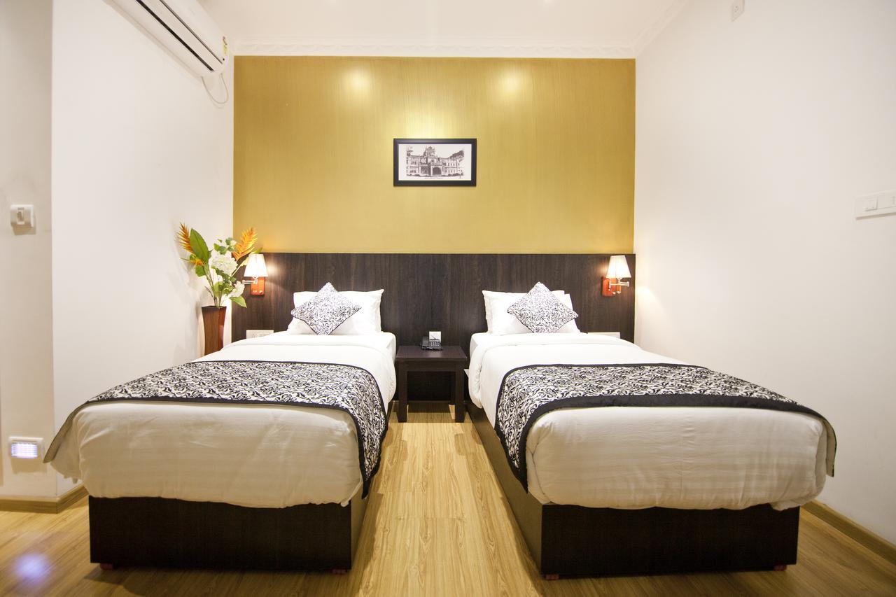 Comfy Luxury Hotel Bangalore Bagian luar foto